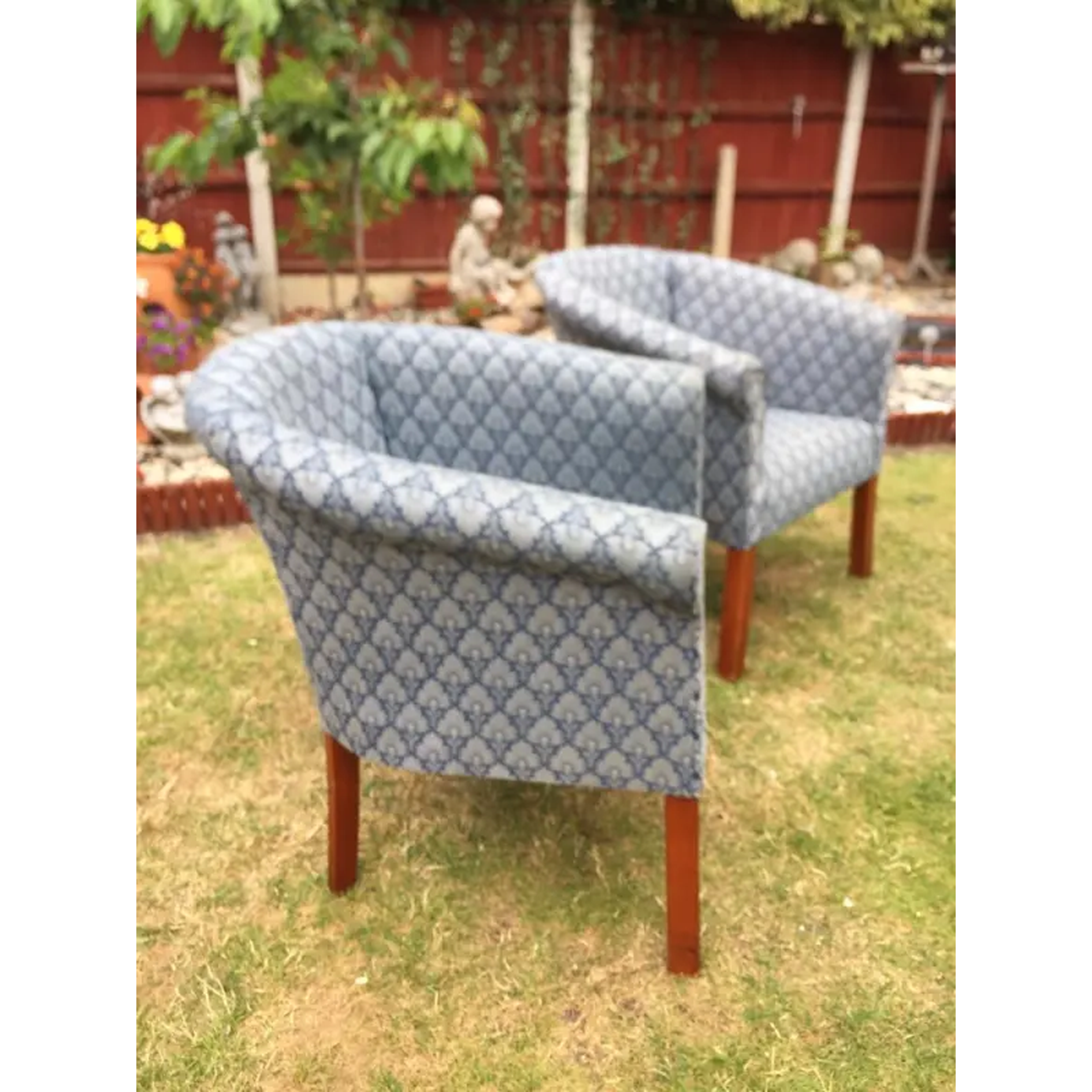 Two matching cup chairs. Delivery available.