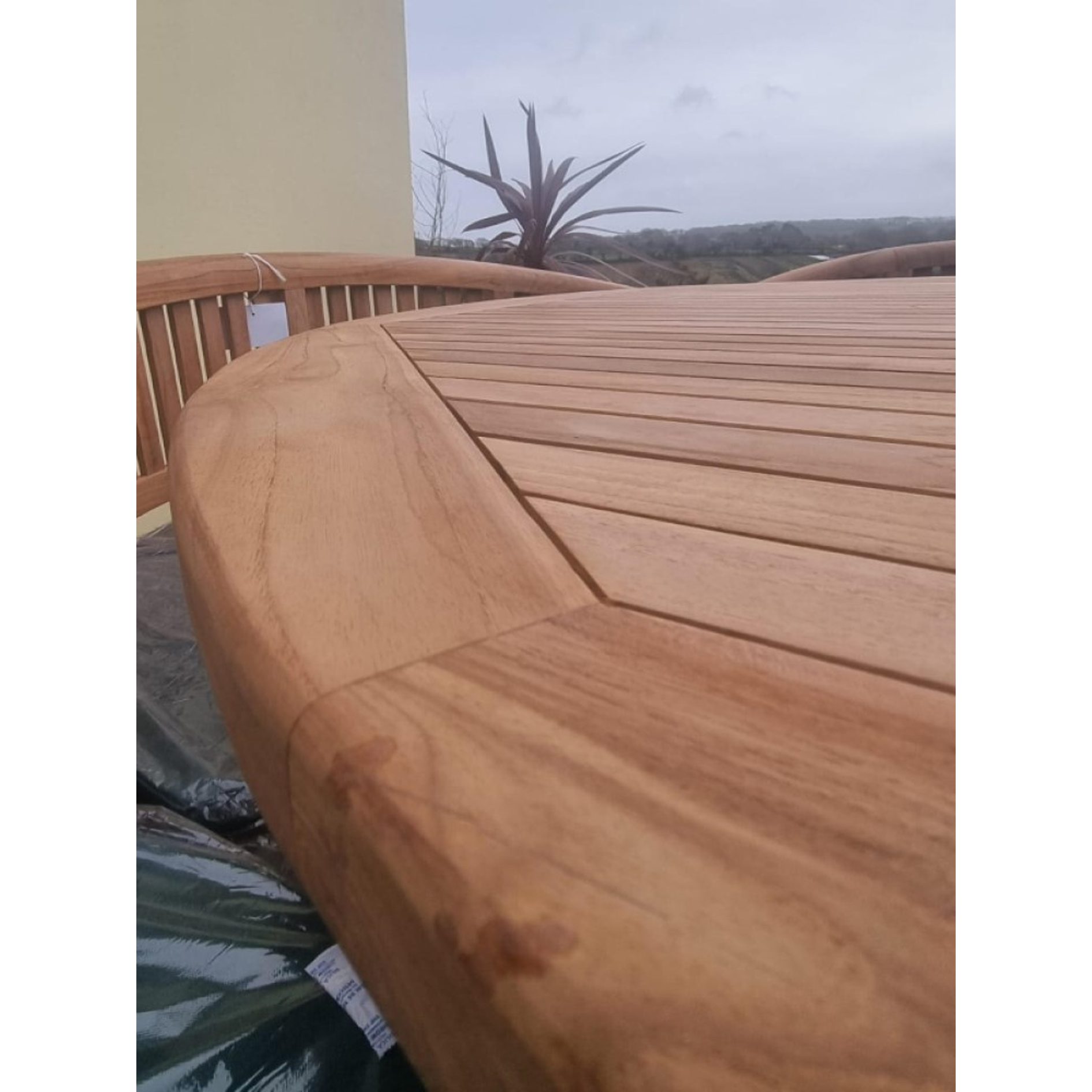 Teak garden dining set. 1.8m “Titan” round table, 4 bowwood style seats